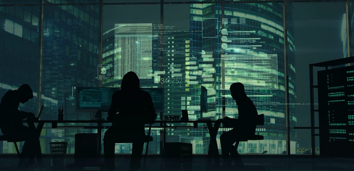 Cybersecurity analysts monitoring a green-lit operations environment